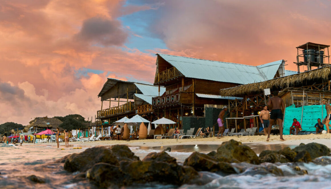 Wooden beach bar in the evening light by the water